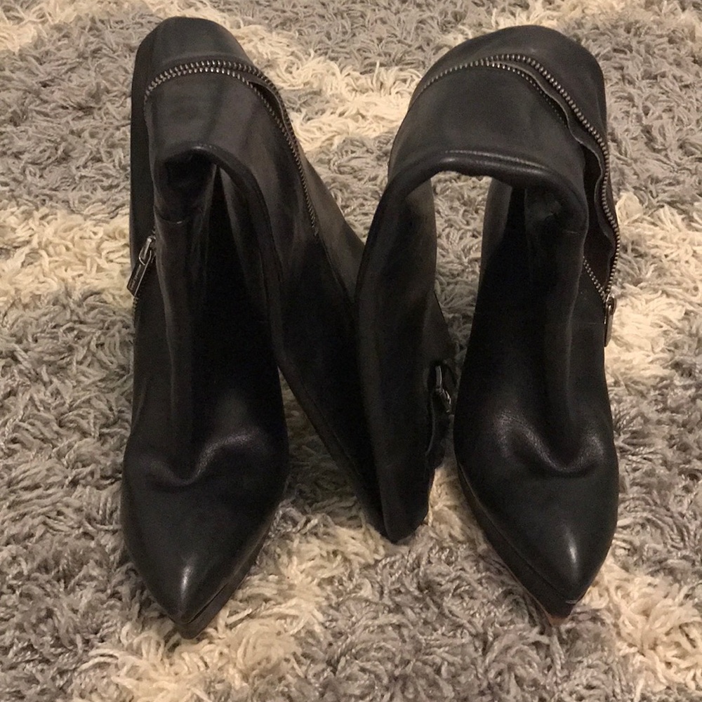Tall heeled boots